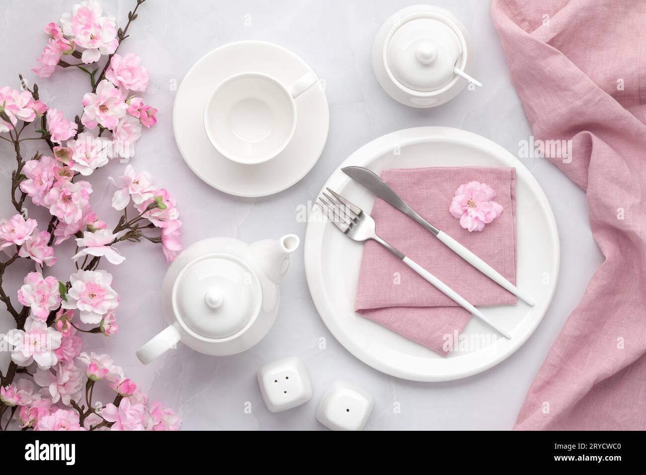 Breakfast concept, morning tea party. Spring flowers. White ceramic ...