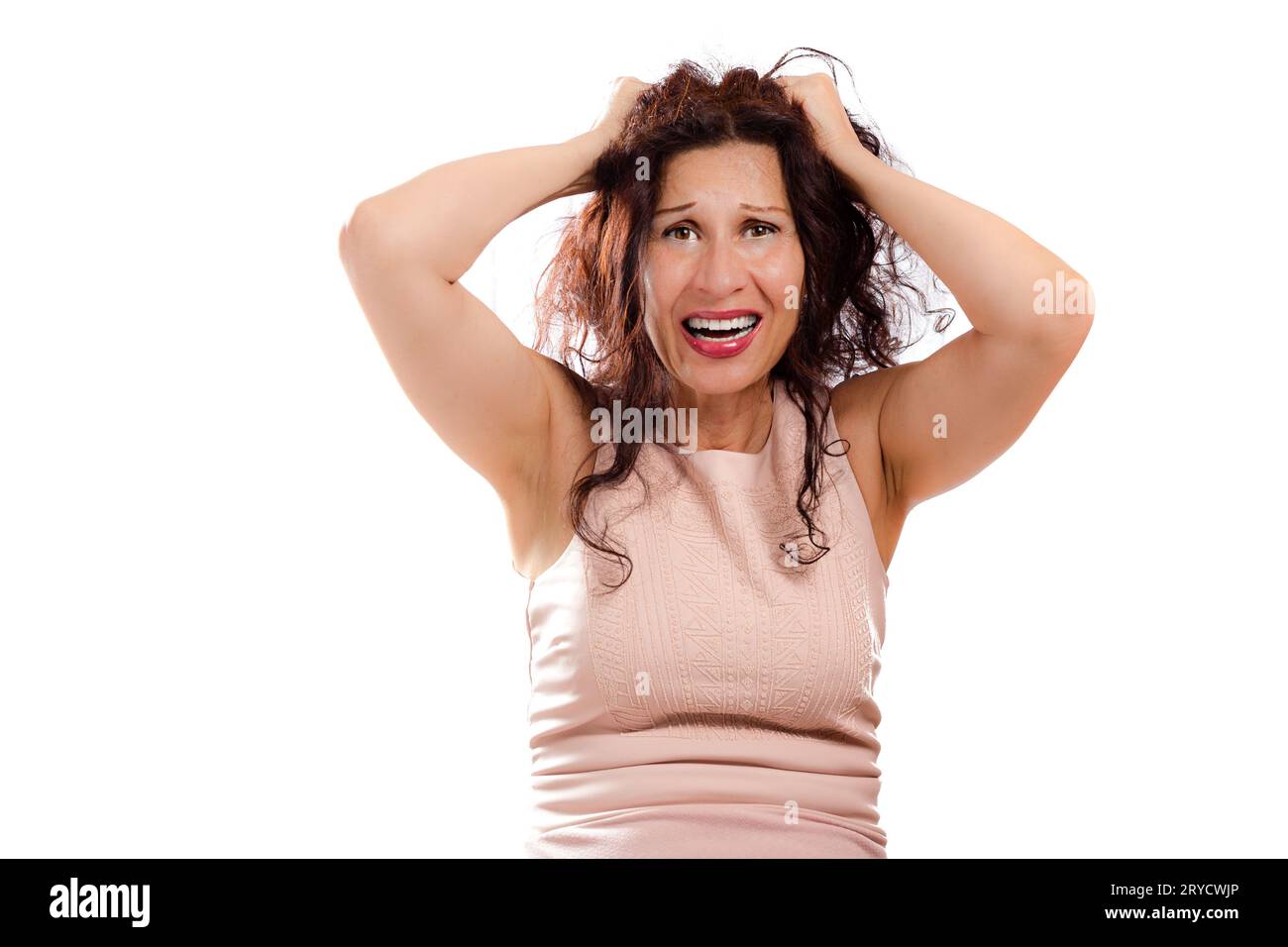 Puzzled mature woman shouting Stock Photo