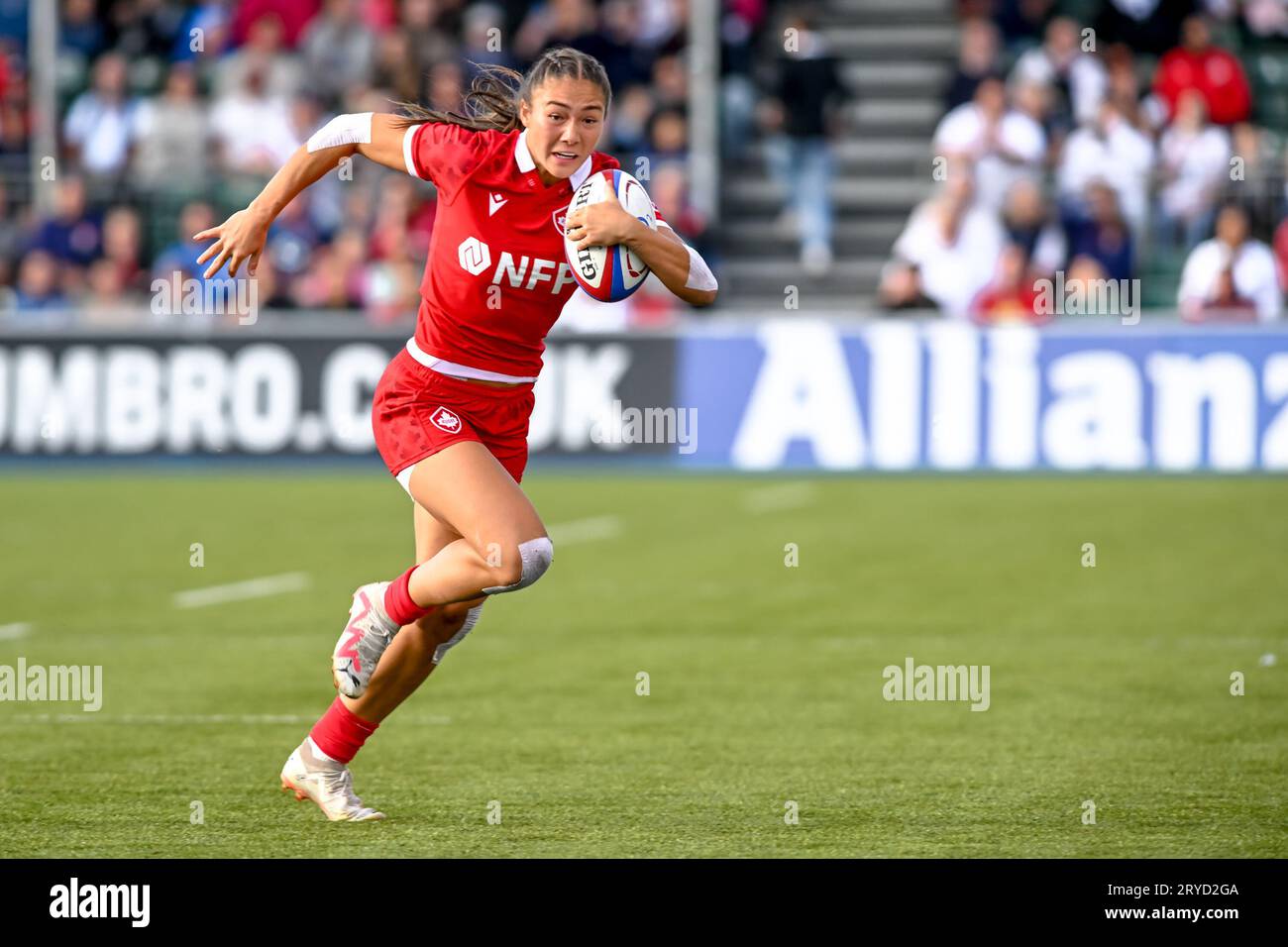 Florence Symonds of Canada Women drives forward with the ball in the ...