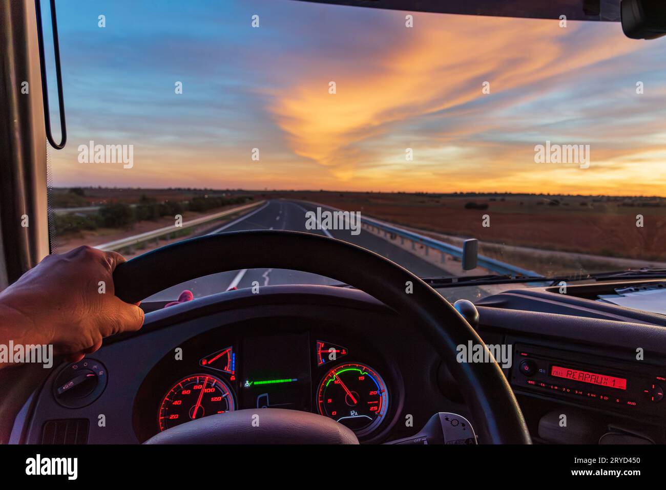View from inside a truck of an empty highway. Stock Photo