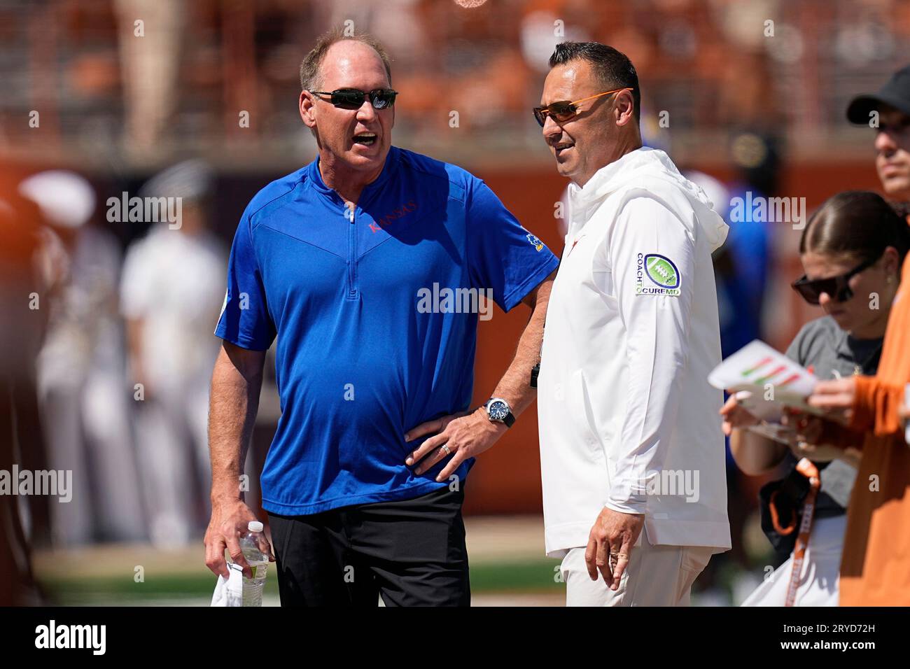 Kansas head coach Lance Leipold, left, talks with Texas head coach ...