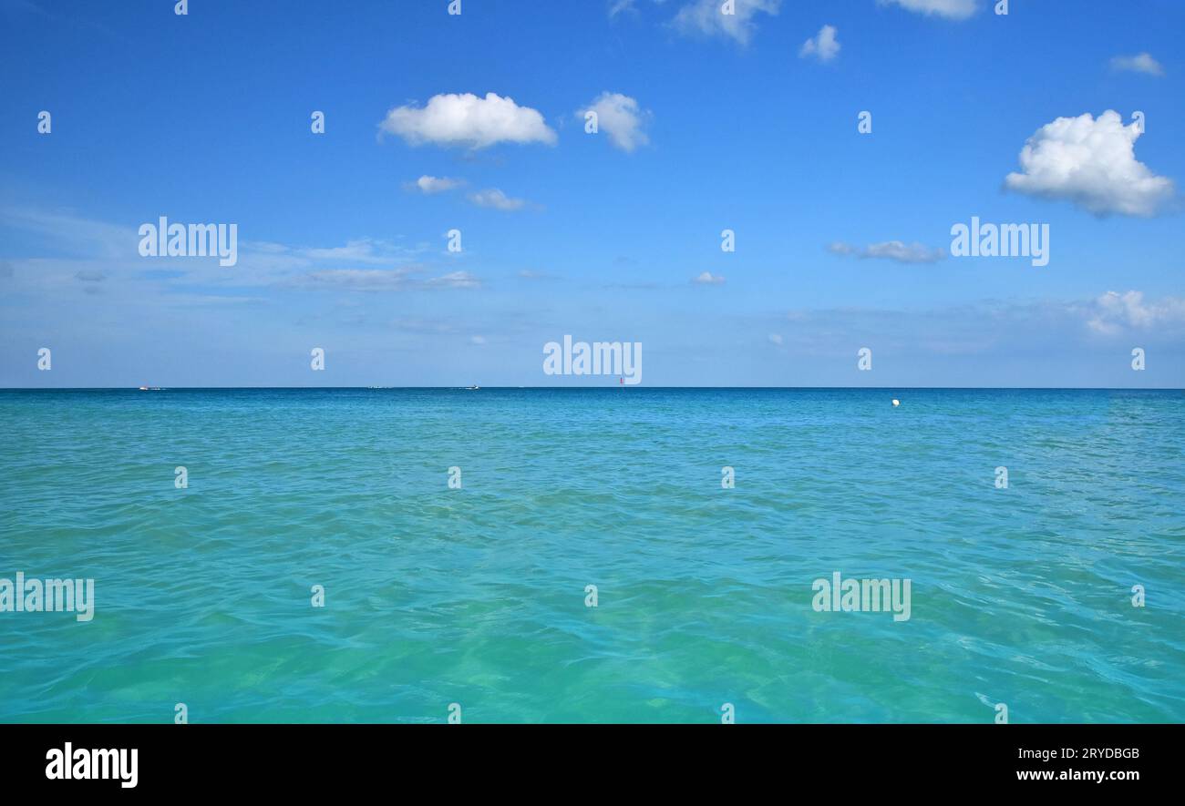 Tranquil scene of blue sea water, horizon and sky Stock Photo