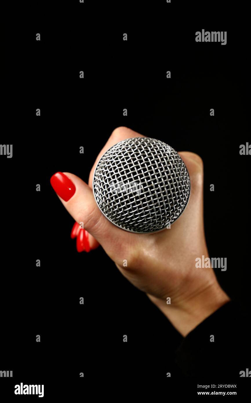 Black woman singing into microphone hi-res stock photography and images ...