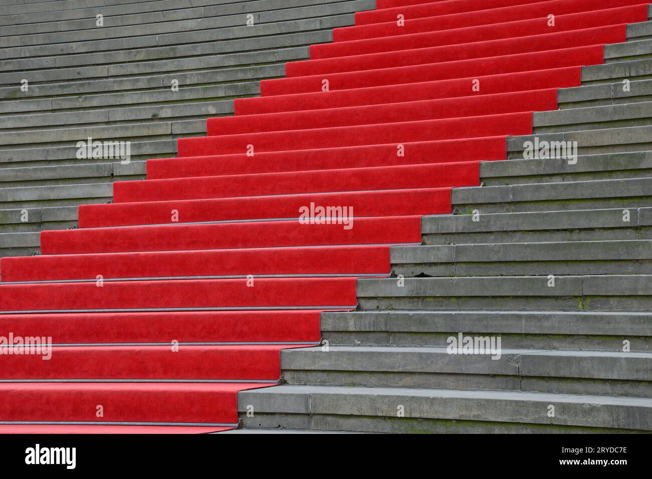 Red carpet over concrete stairs perspective Stock Photo