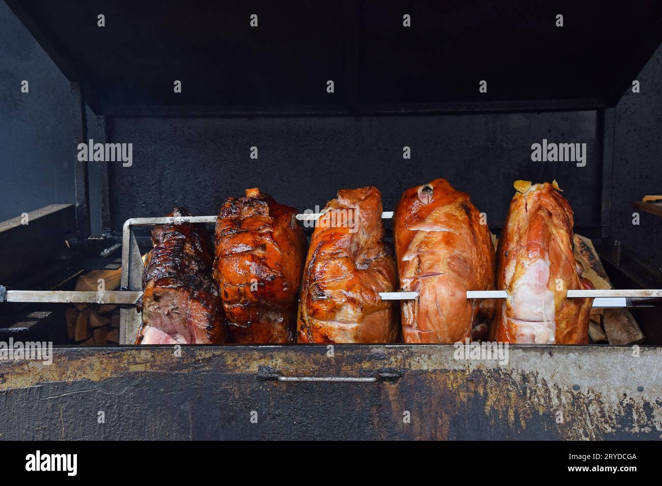 Close up pork meat roasted on open wood fire Stock Photo Alamy