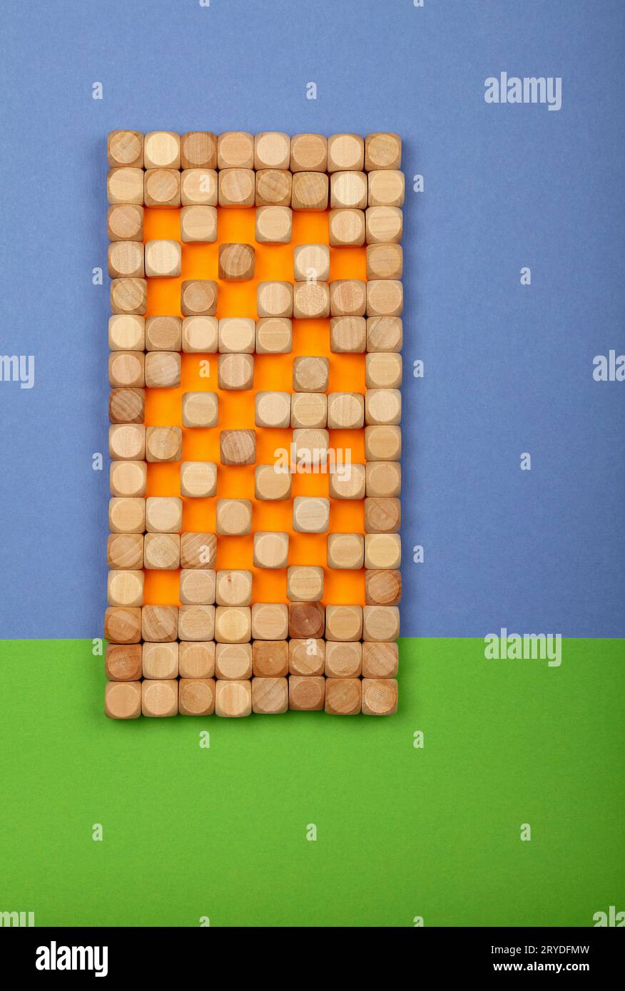 Wooden toy building blocks in shape high house Stock Photo