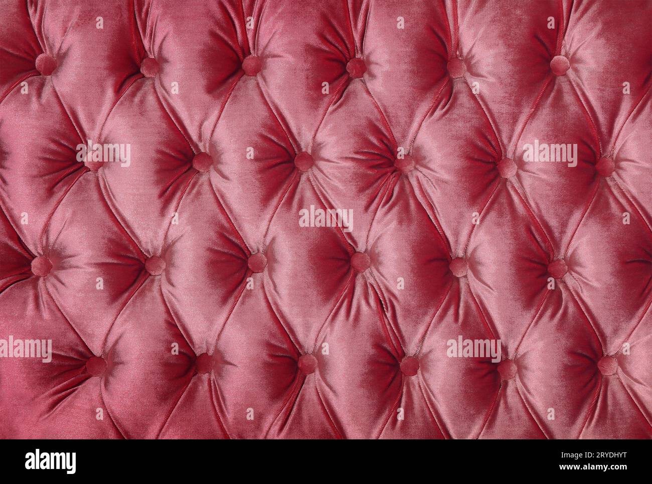 Pink capitone tufted fabric upholstery texture Stock Photo