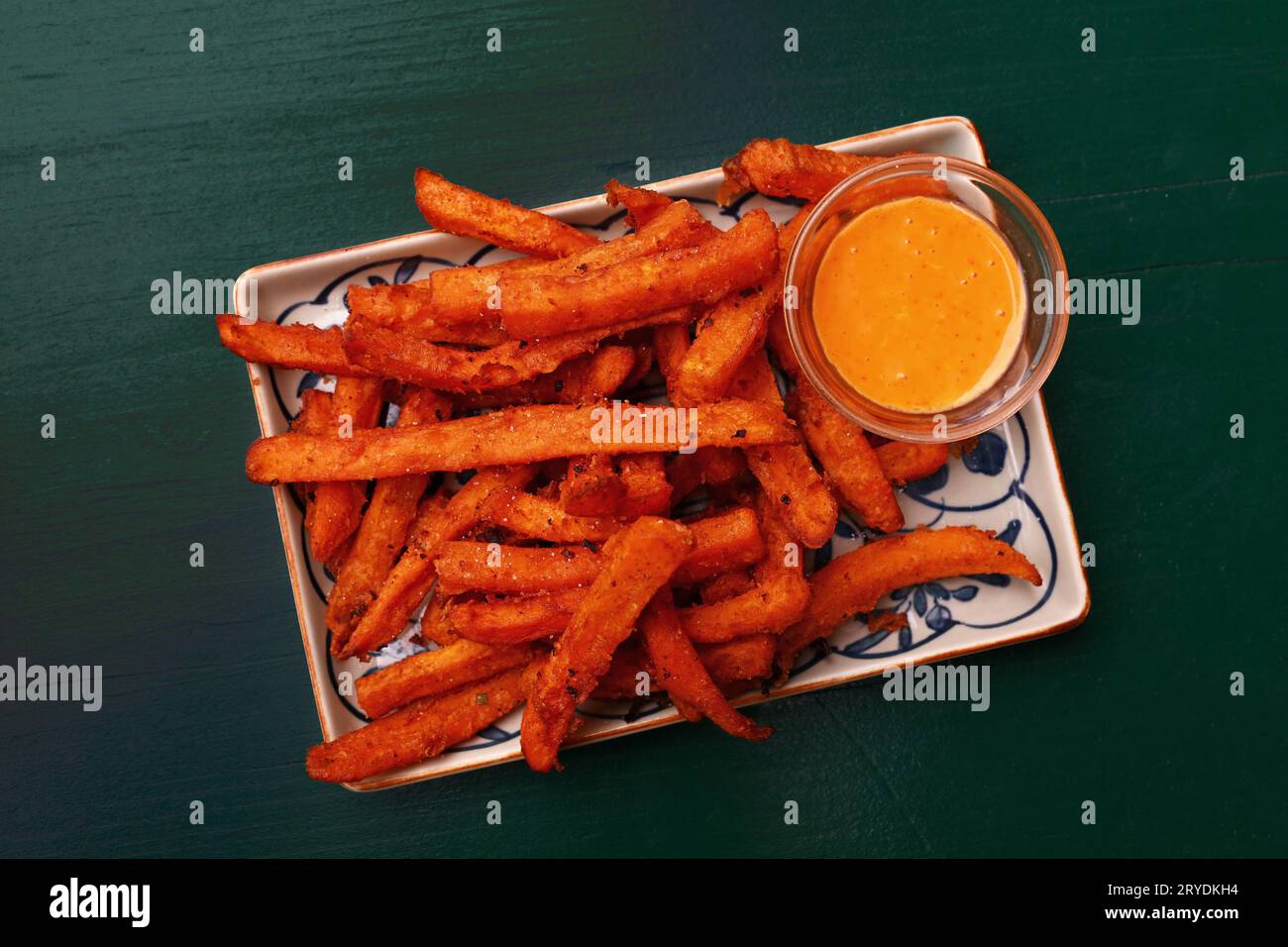 Portion of deep fried sweet potato chips Stock Photo Alamy