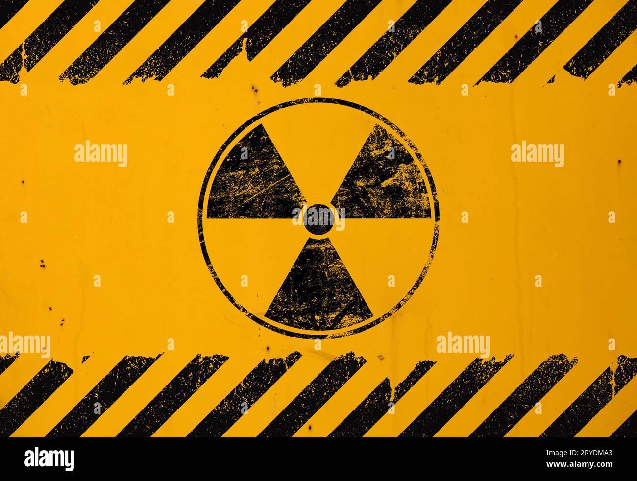 Black radioactive sign over yellow background Stock Photo