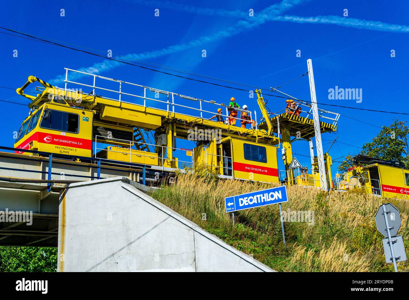 Wałbrzych, Poland - 20.09.2023: PKP Elektryka fixing overhead power lines on the railroad track Stock Photo