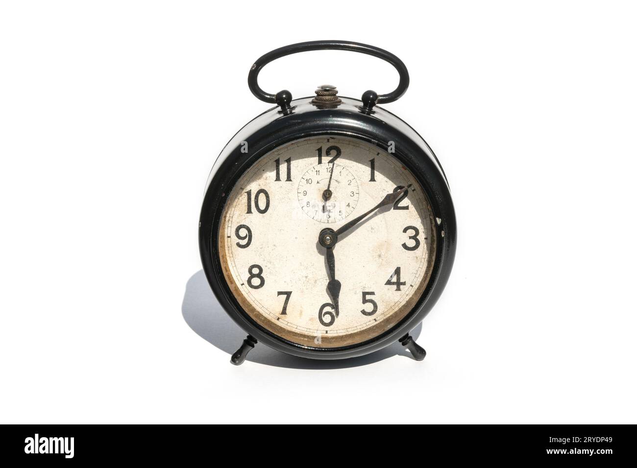 Old alarm clock isolated on white background Stock Photo - Alamy