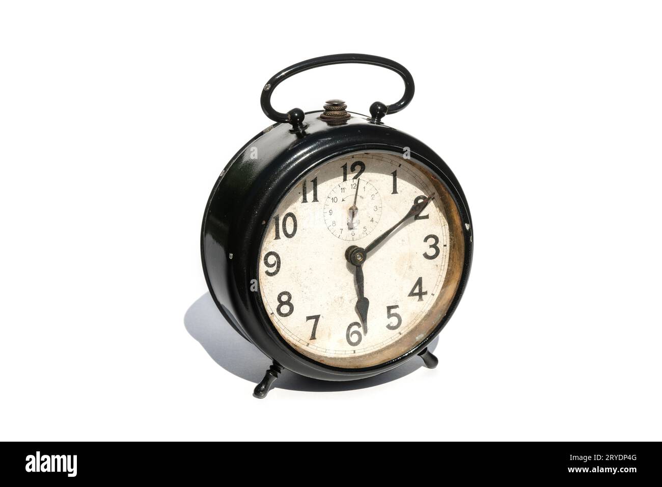 Old alarm clock isolated on white background Stock Photo - Alamy