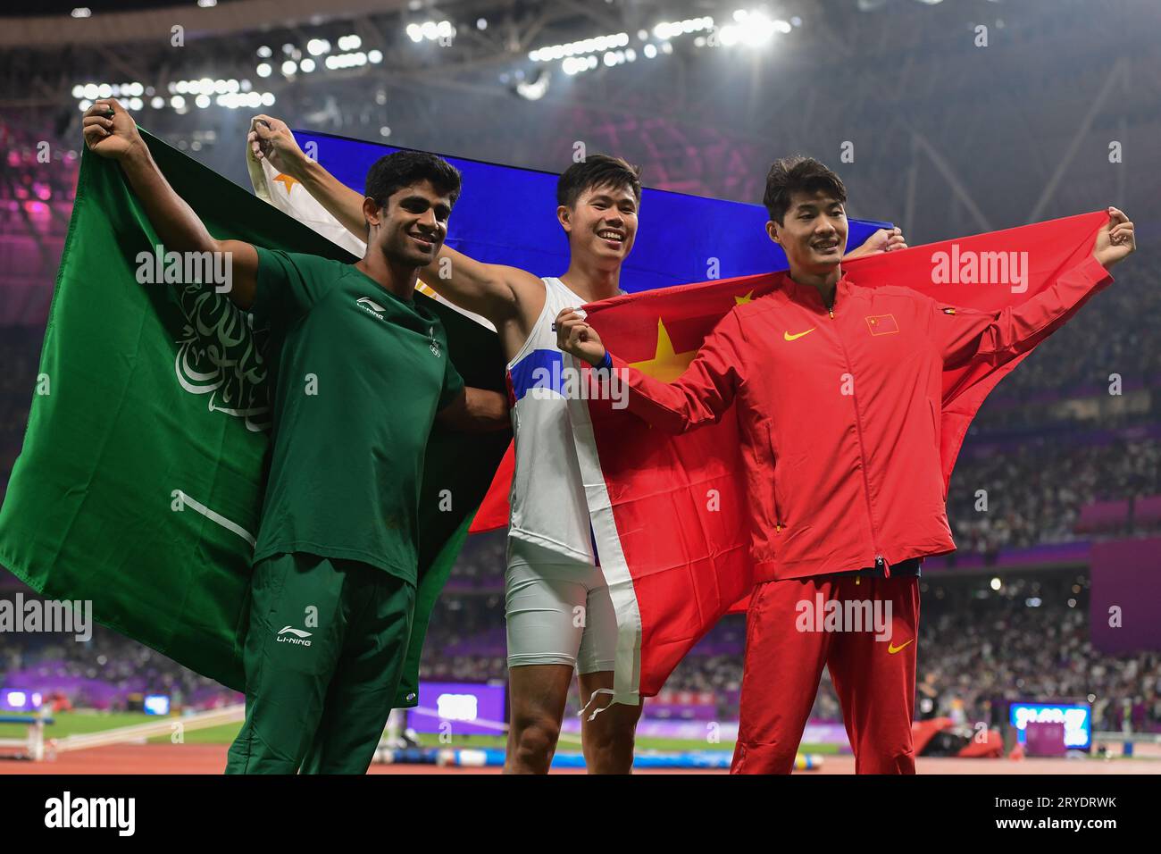 Hangzhou, China. 30th Sep, 2023. Hussain Asim M Al Hizam (L) of Saudi Arabia, Ernest John Obiena (M) of the Philippines, Huang Bokai (R) of People's Republic of China are seen during the 19th Asian Games Men's Pole Vault finals held at the Hangzhou Olympic Sports Centre Stadium. Credit: SOPA Images Limited/Alamy Live News Stock Photo