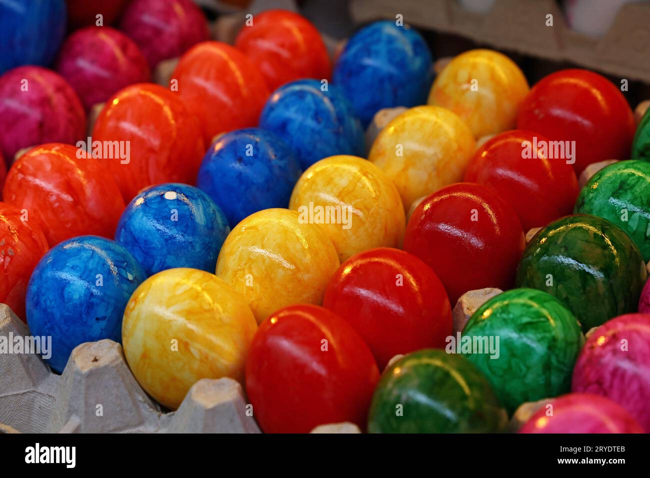 Close up painted Easter eggs in tray carton Stock Photo