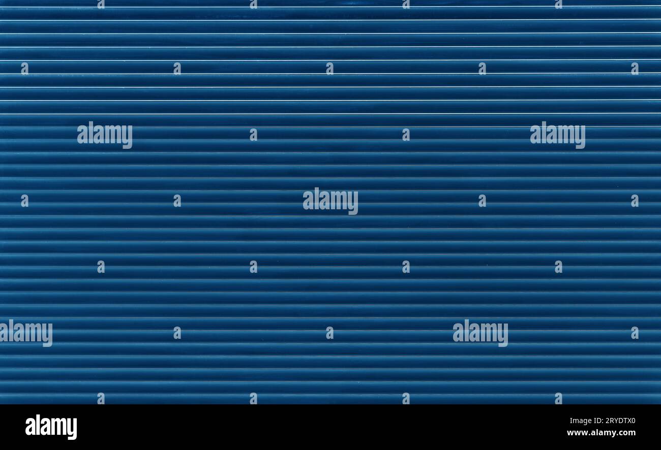 Indigo blue horizontal roller shutter blinds Stock Photo