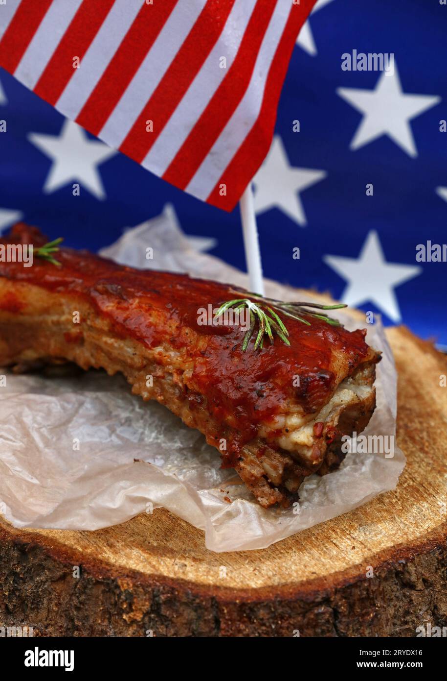 Pork spare ribs in bbq sauce over American flag Stock Photo - Alamy