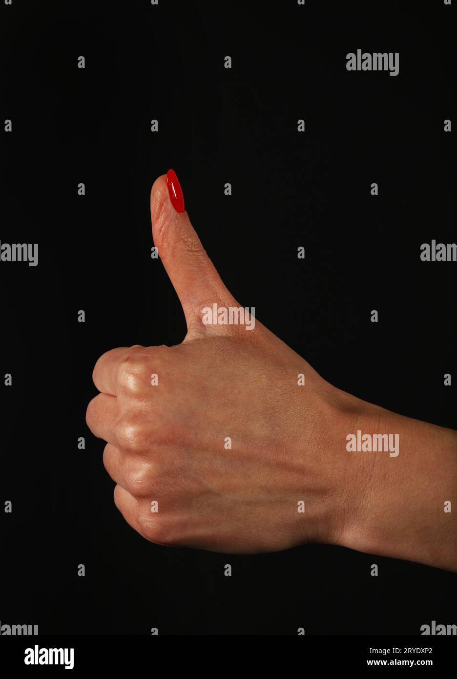 Woman hand with OK like gesture over black Stock Photo