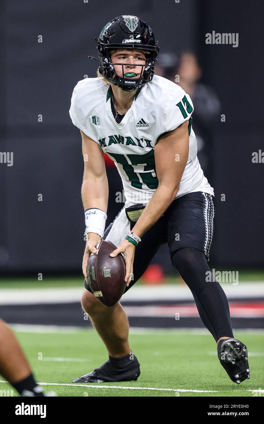 Las Vegas, NV, USA. 30th Sep, 2023. Hawaii Rainbow Warriors quarterback  Brayden Schager (13) pitches the football during the first half of the  college football game featuring the Hawaii Warriors and the
