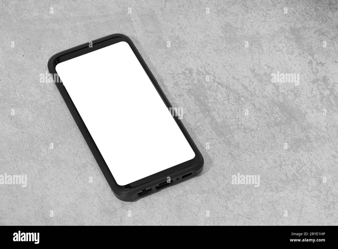 Smart phone with white screen isolated on textured concrete background Stock Photo