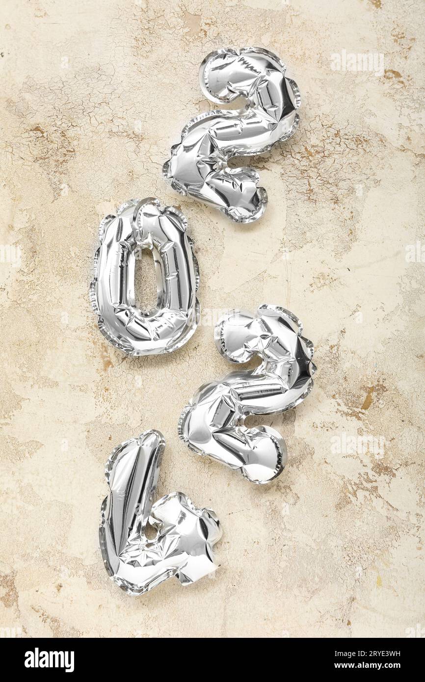 Figure 2024 Made Of Silver Foil Balloons On Light Background Stock   Figure 2024 Made Of Silver Foil Balloons On Light Background 2RYE3WH 