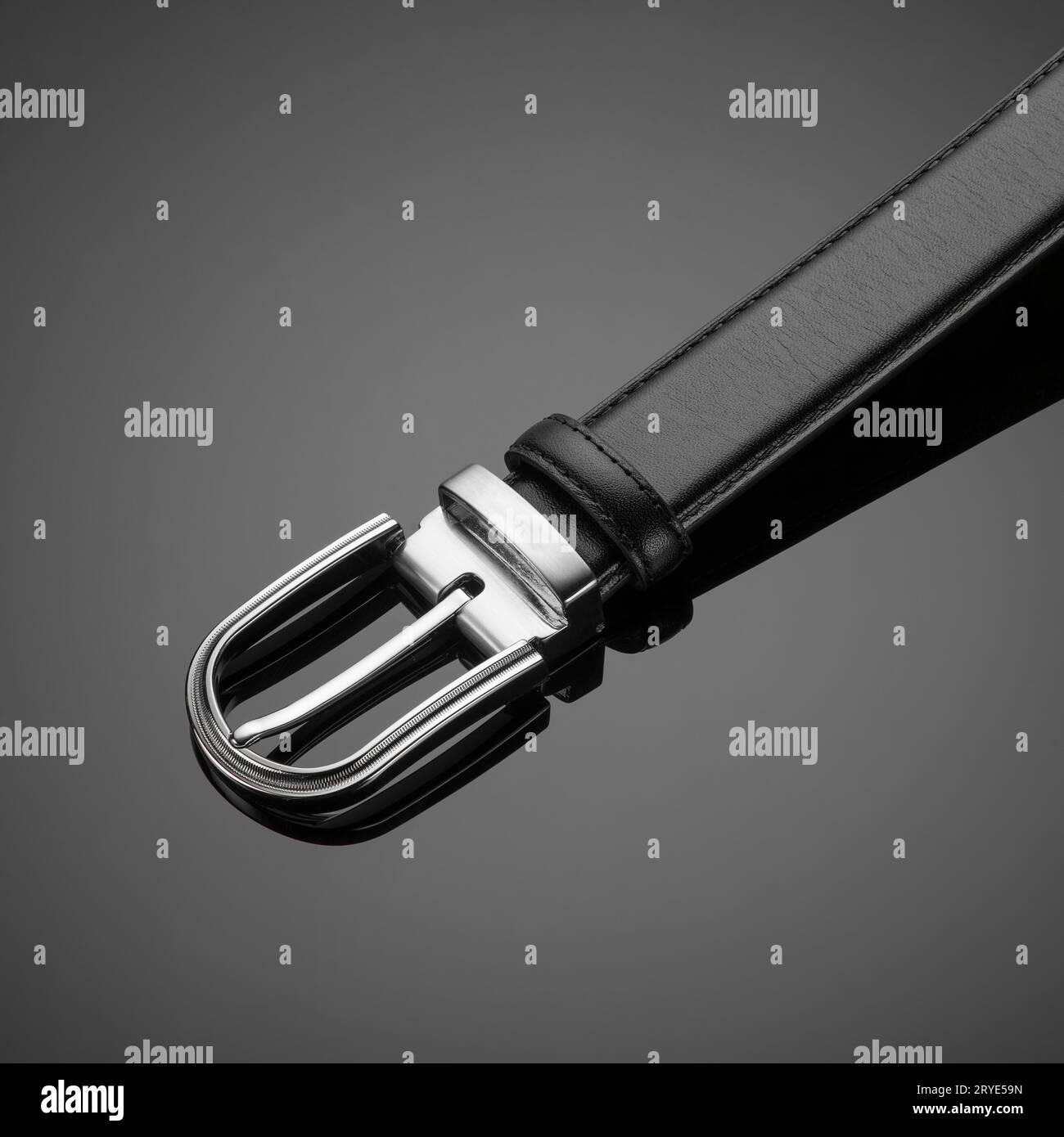 Belt on black background Stock Photo - Alamy