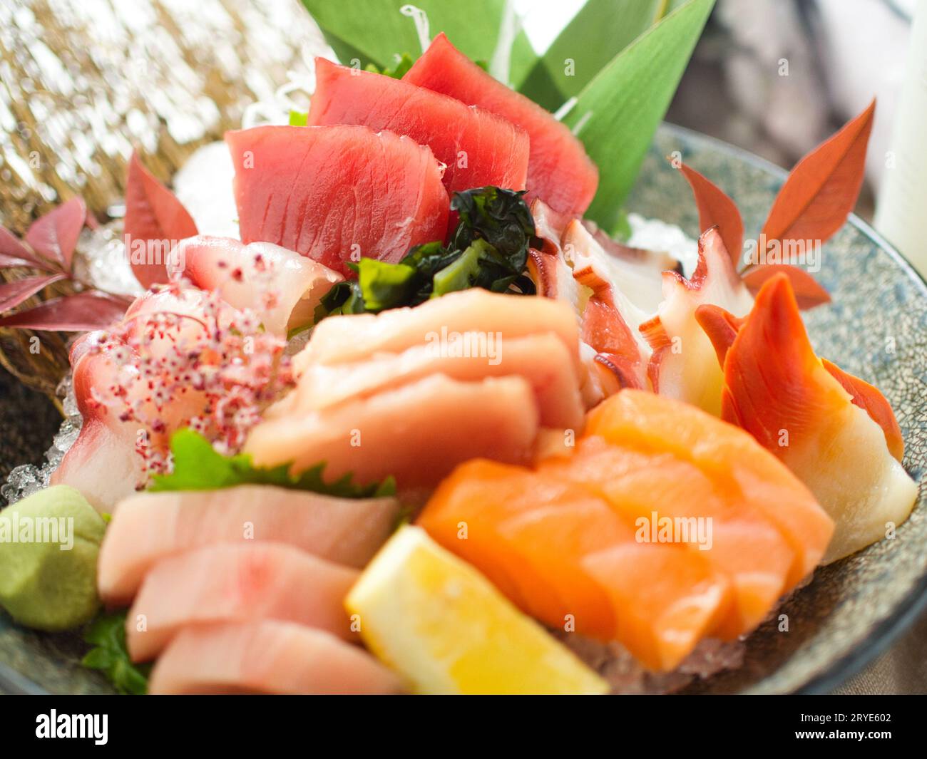 Large bowl of colorful assorted sashimi chirashi at Japanese restaurant. Stock Photo
