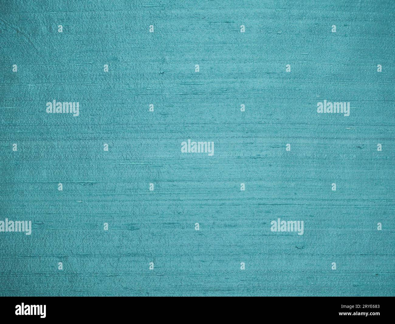 Faded blue dupioni silk fabric laid flat background for texture or text. Stock Photo