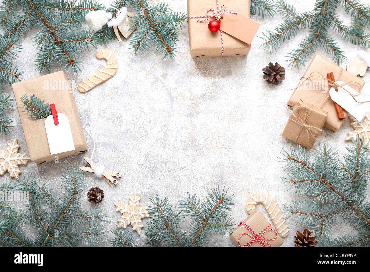 Frame made of Christmas tree branches with beautiful decorations and ...