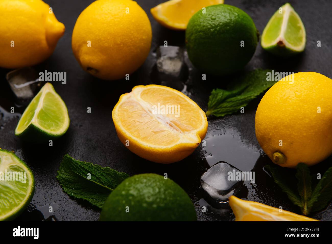 Ingredients for preparing lemonade on black background Stock Photo