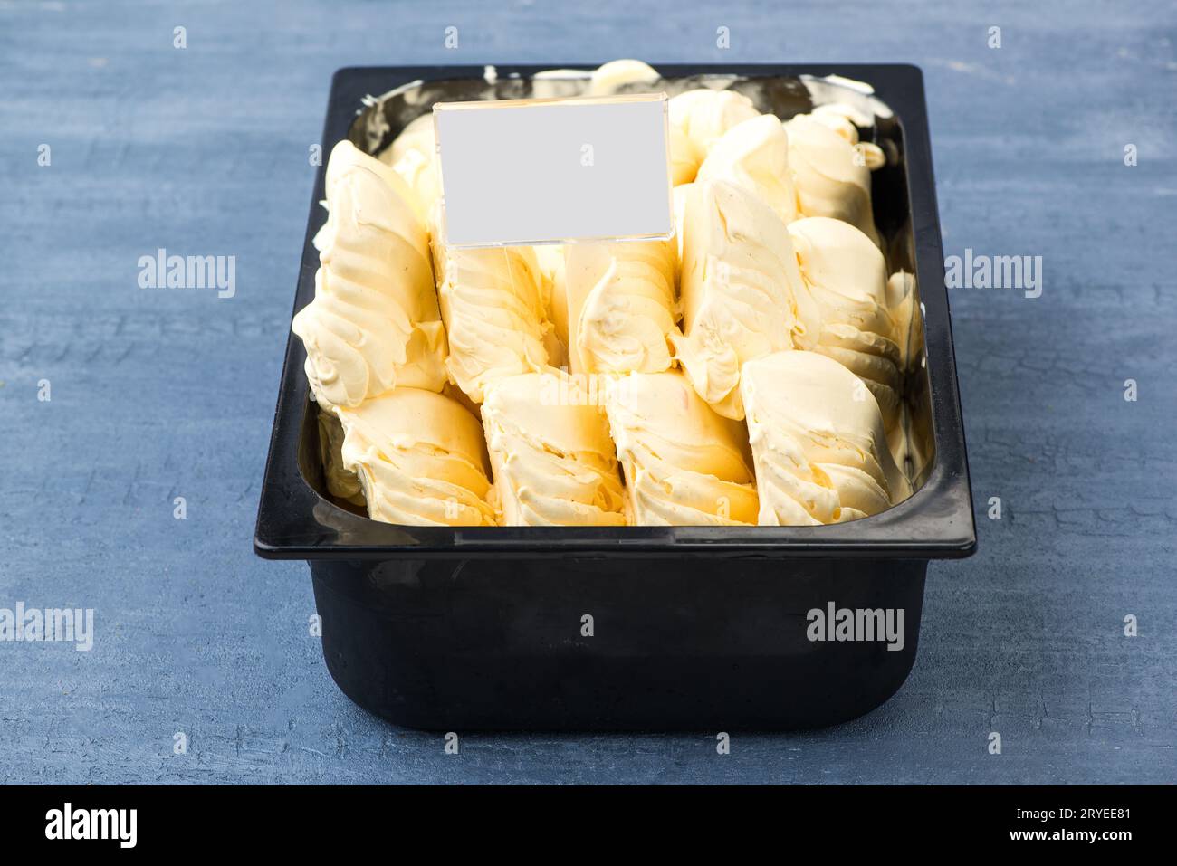 https://c8.alamy.com/comp/2RYEE81/ice-cream-in-a-plastic-container-2RYEE81.jpg