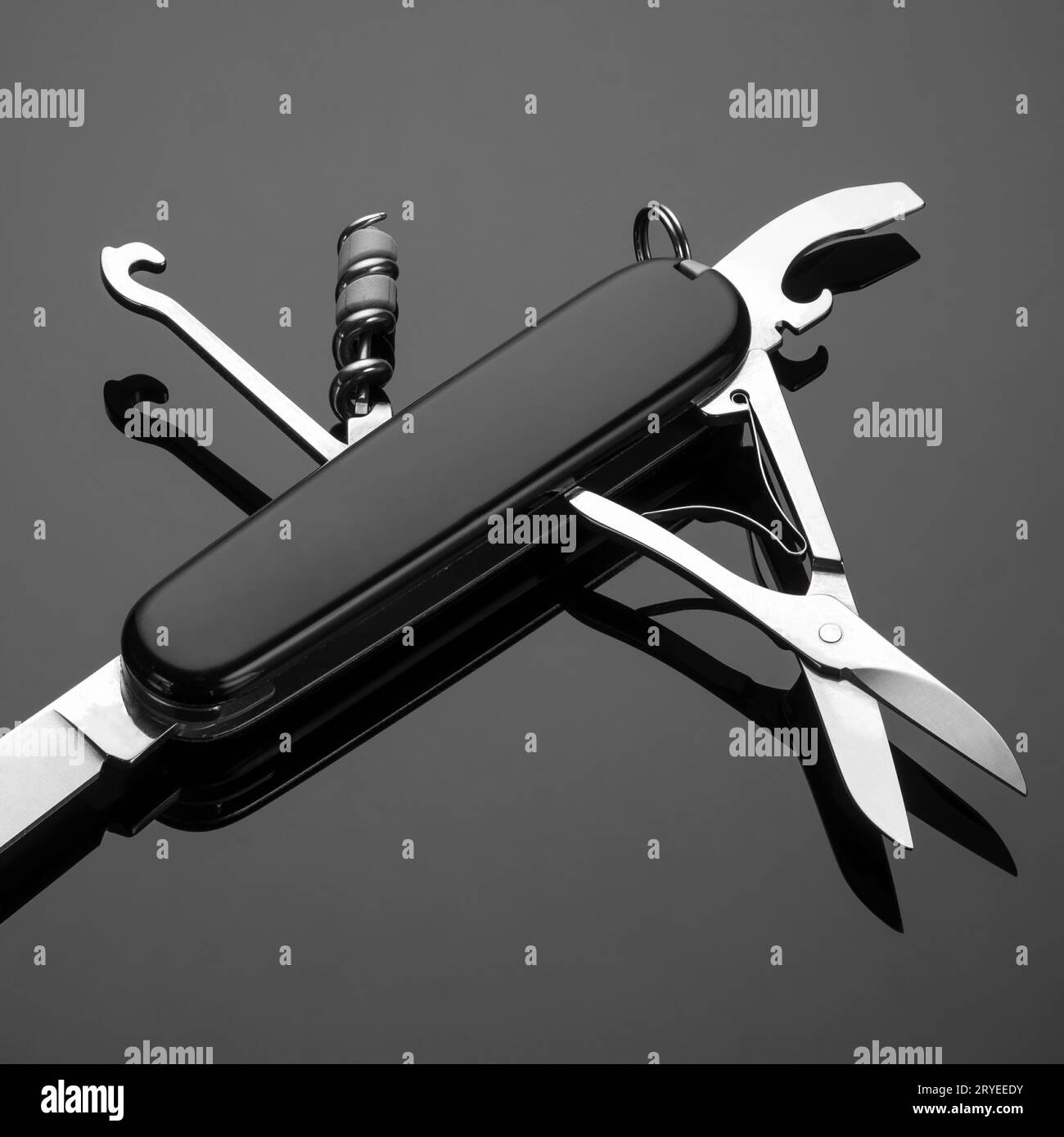 Folding knife on a black background Stock Photo