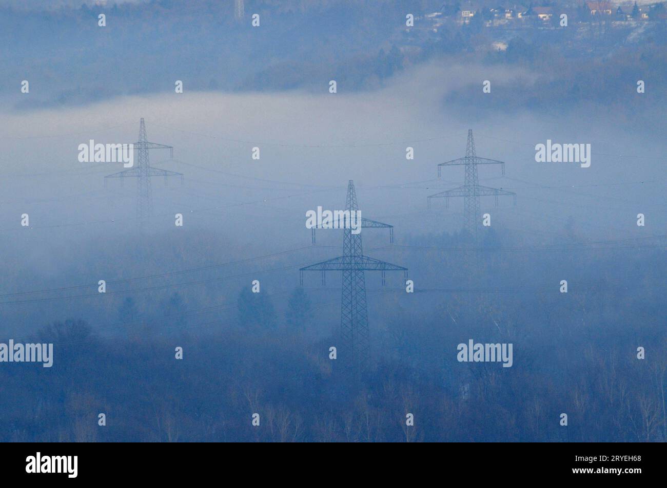 High voltage line in the alps in winter Stock Photo - Alamy