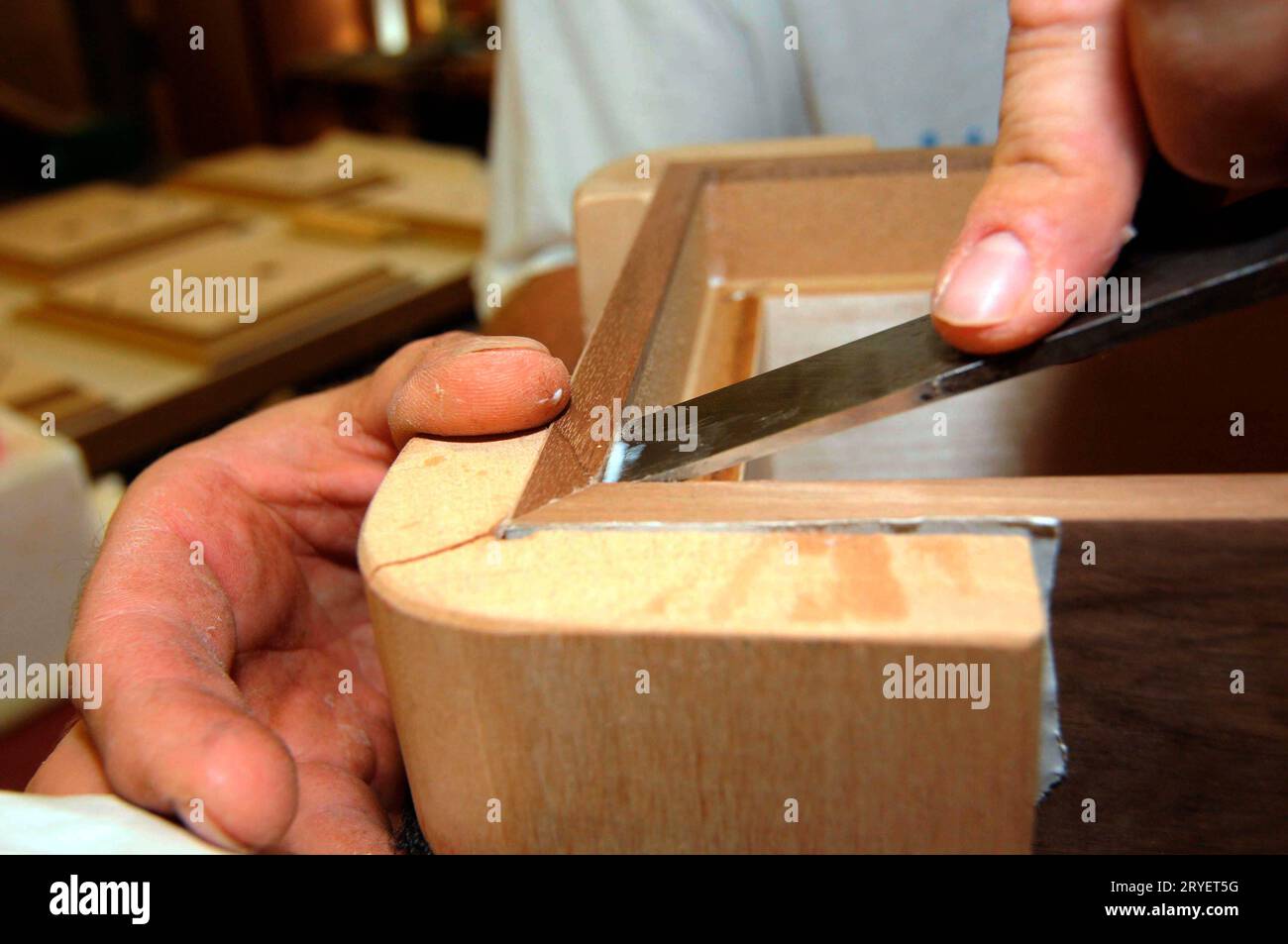 Chiseling wood in the carpentry Stock Photo