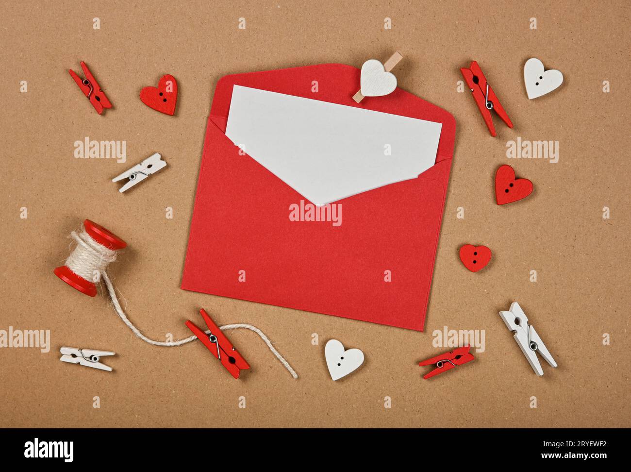 Red Valentine card envelope on brown paper Stock Photo - Alamy