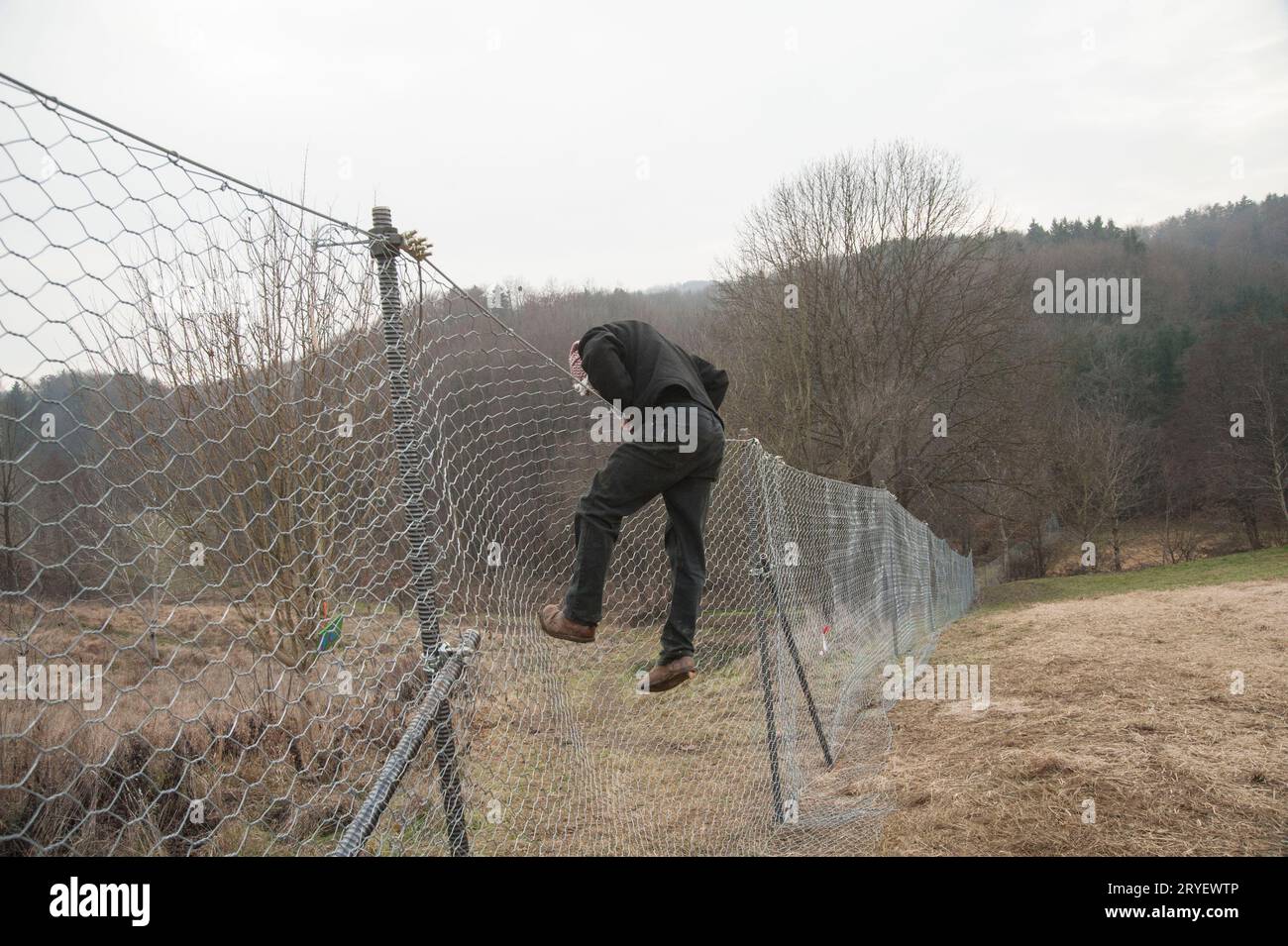 Overcoming an obstacle on a parkour Stock Photo - Alamy