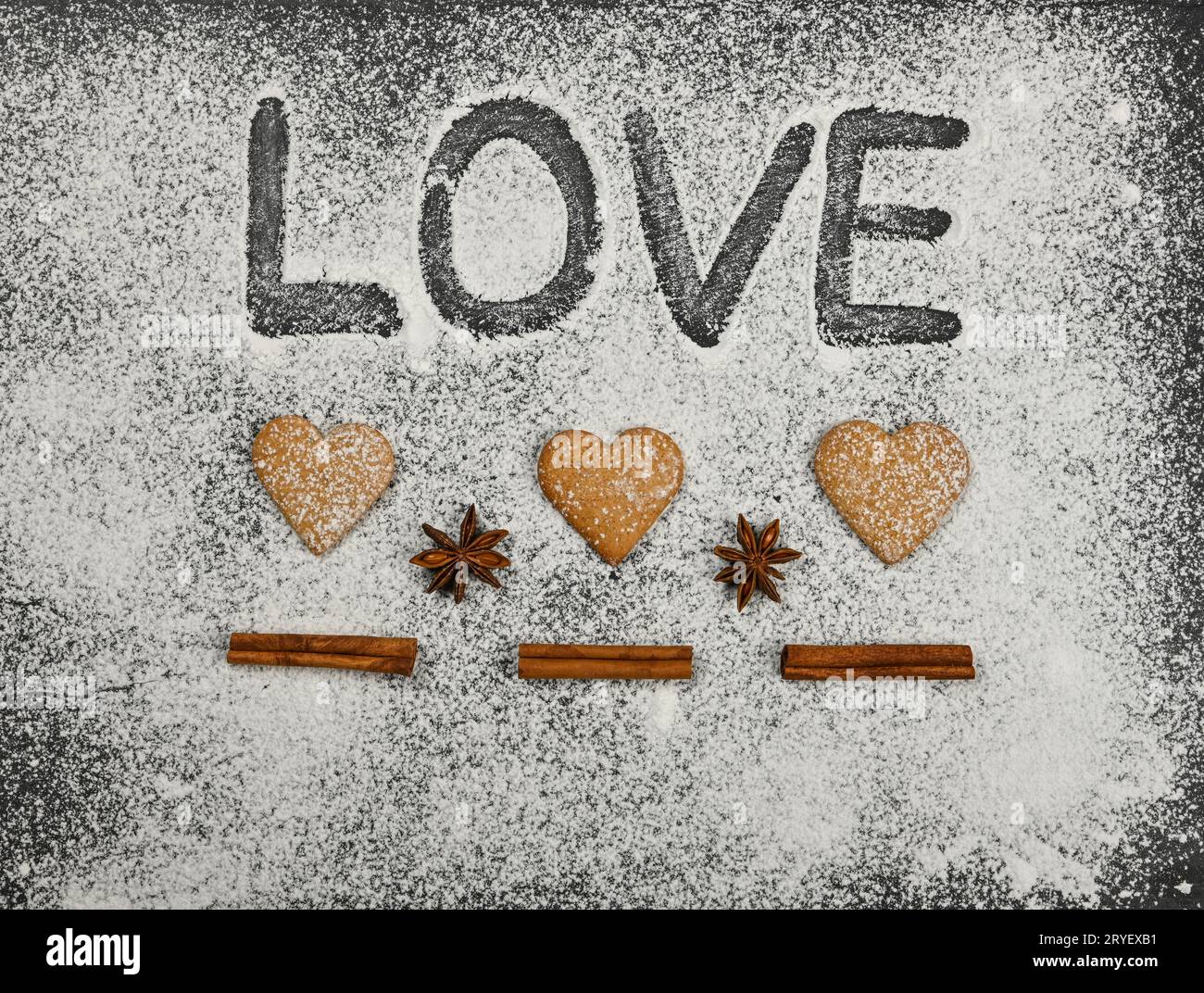 Heart shaped gingerbread cookies and love word Stock Photo
