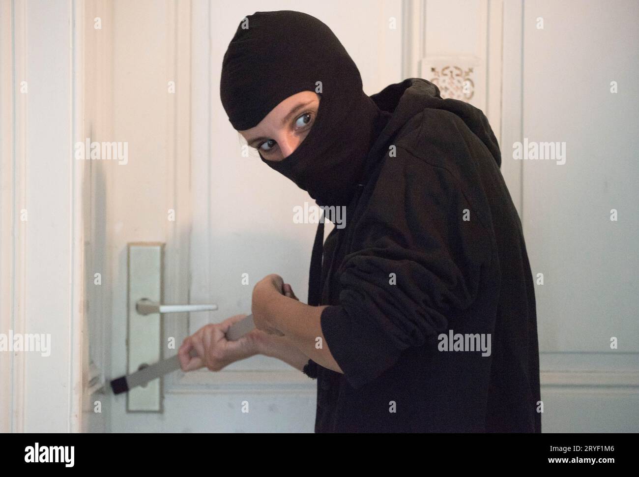 Breaking and entering into an apartment Stock Photo Alamy