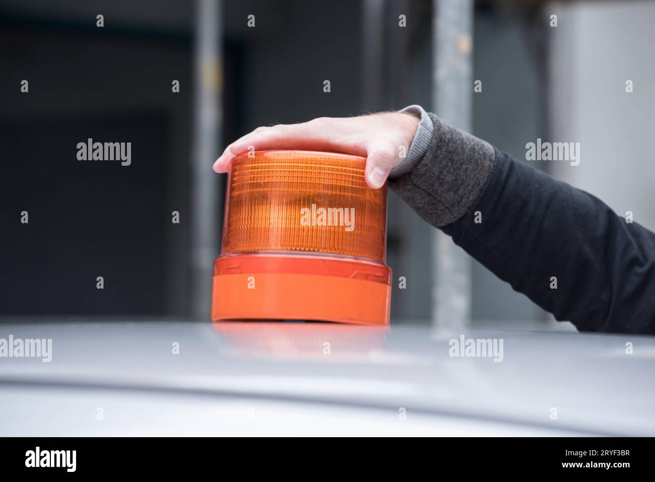 Orange flashing light for a car Stock Photo