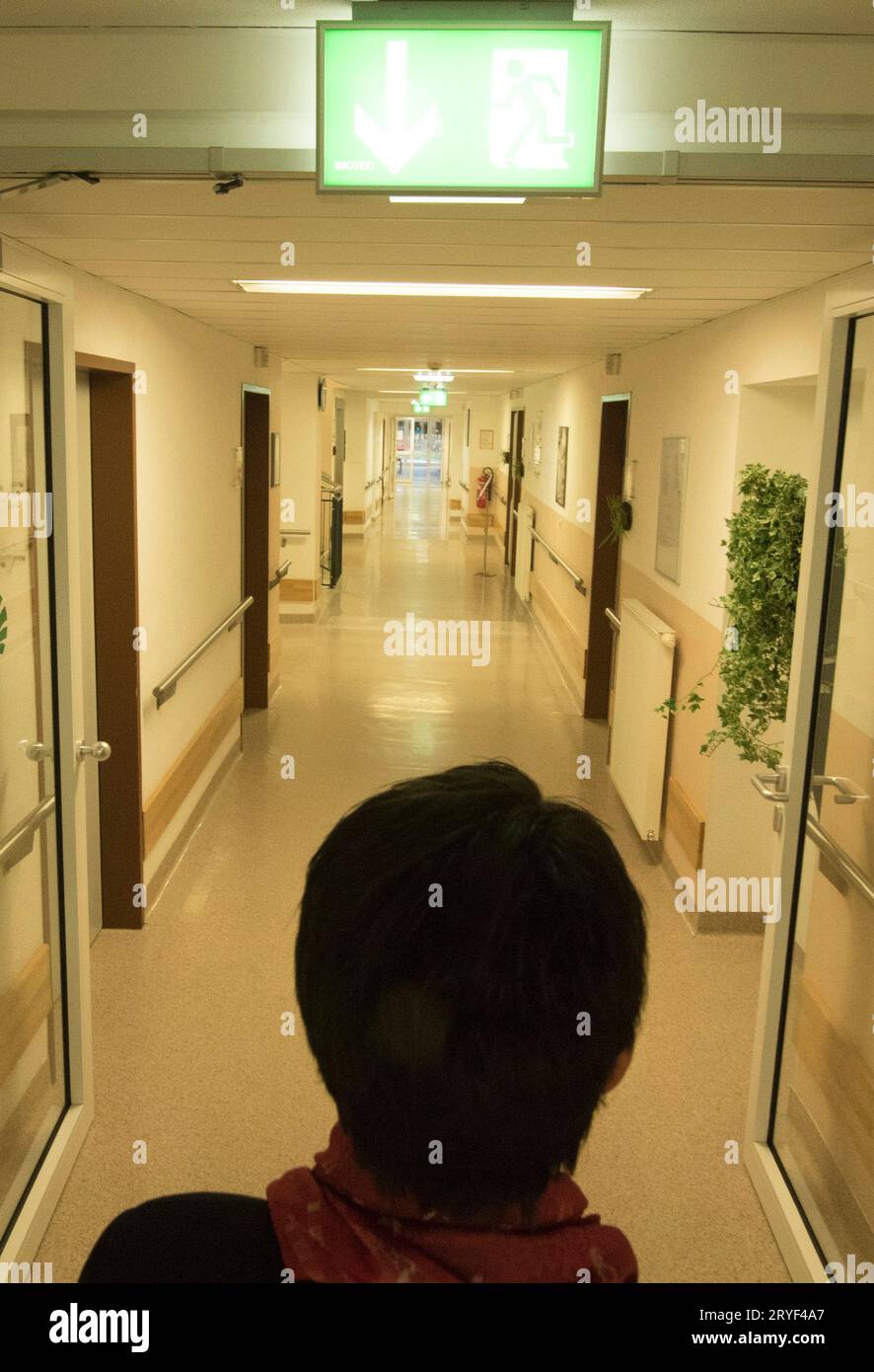 Standing in a hospital hallway Stock Photo