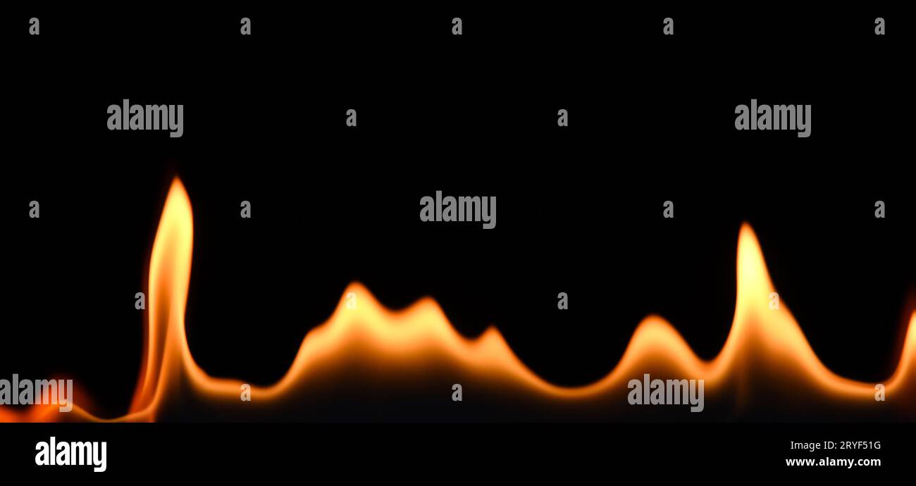 Close up fire flames isolated on black background Stock Photo