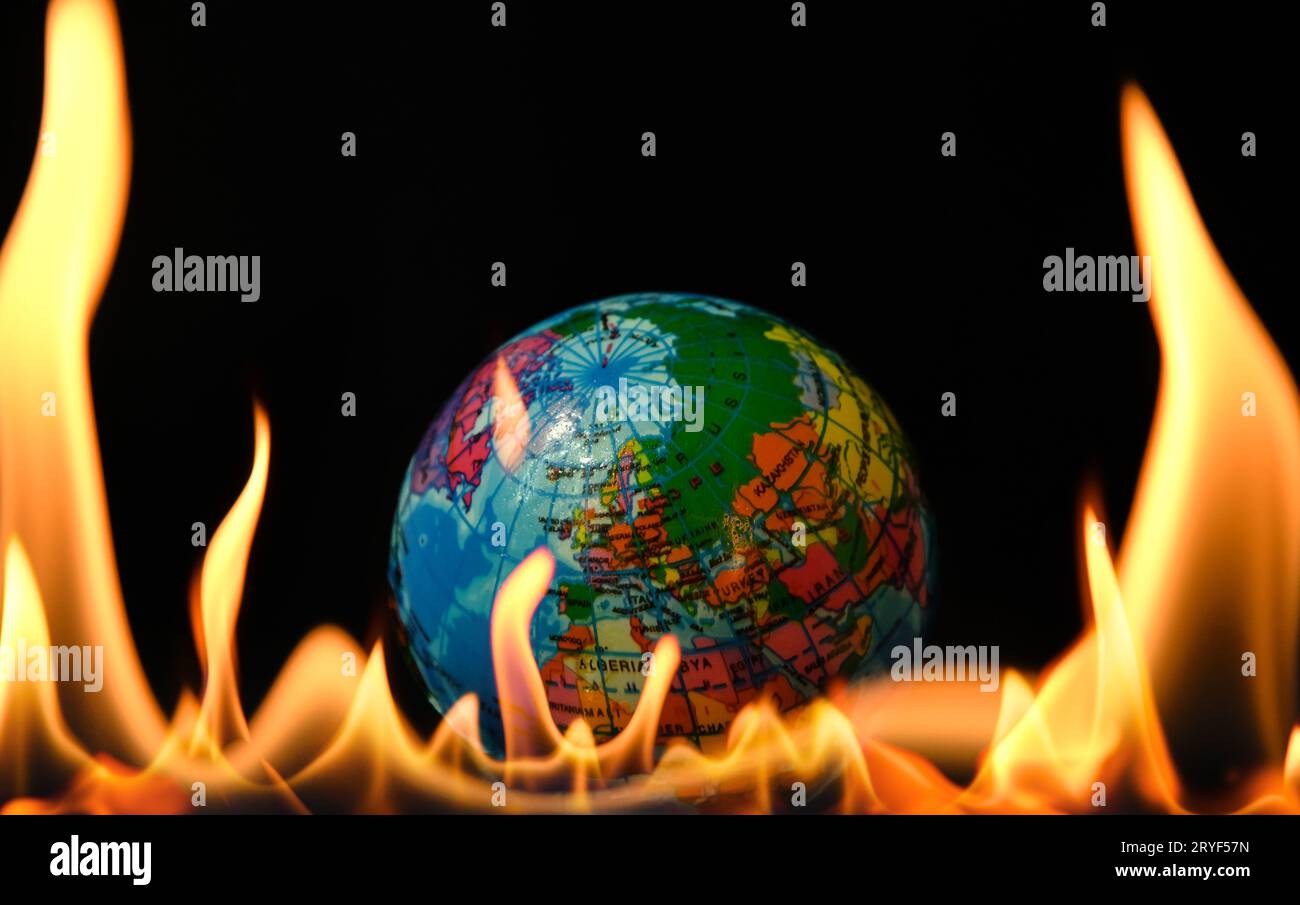 World globe in fire flames Stock Photo Alamy