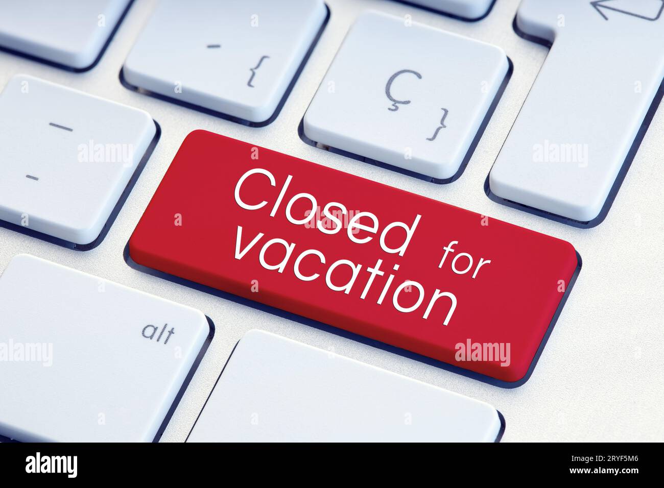 Closed for vacation phrase on computer Keyboard Key Stock Photo
