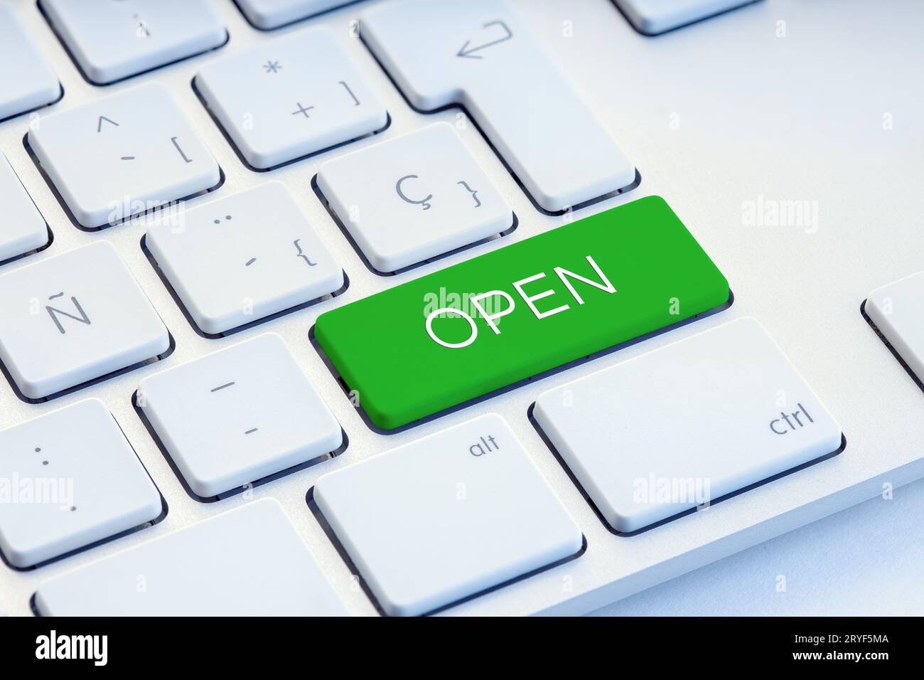 Open word on green computer Keyboard Key Stock Photo