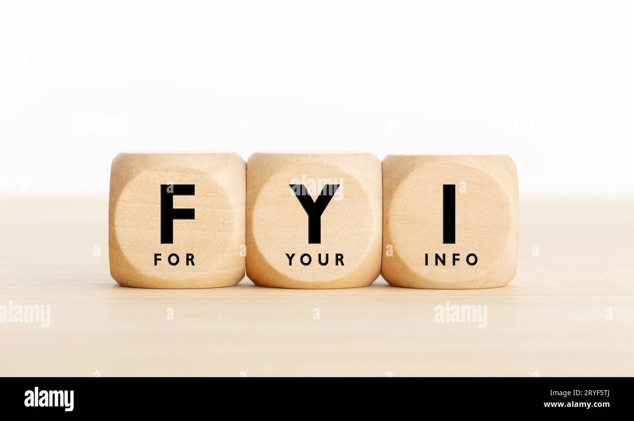 FYI or for your information text on wooden blocks. Copy space Stock Photo