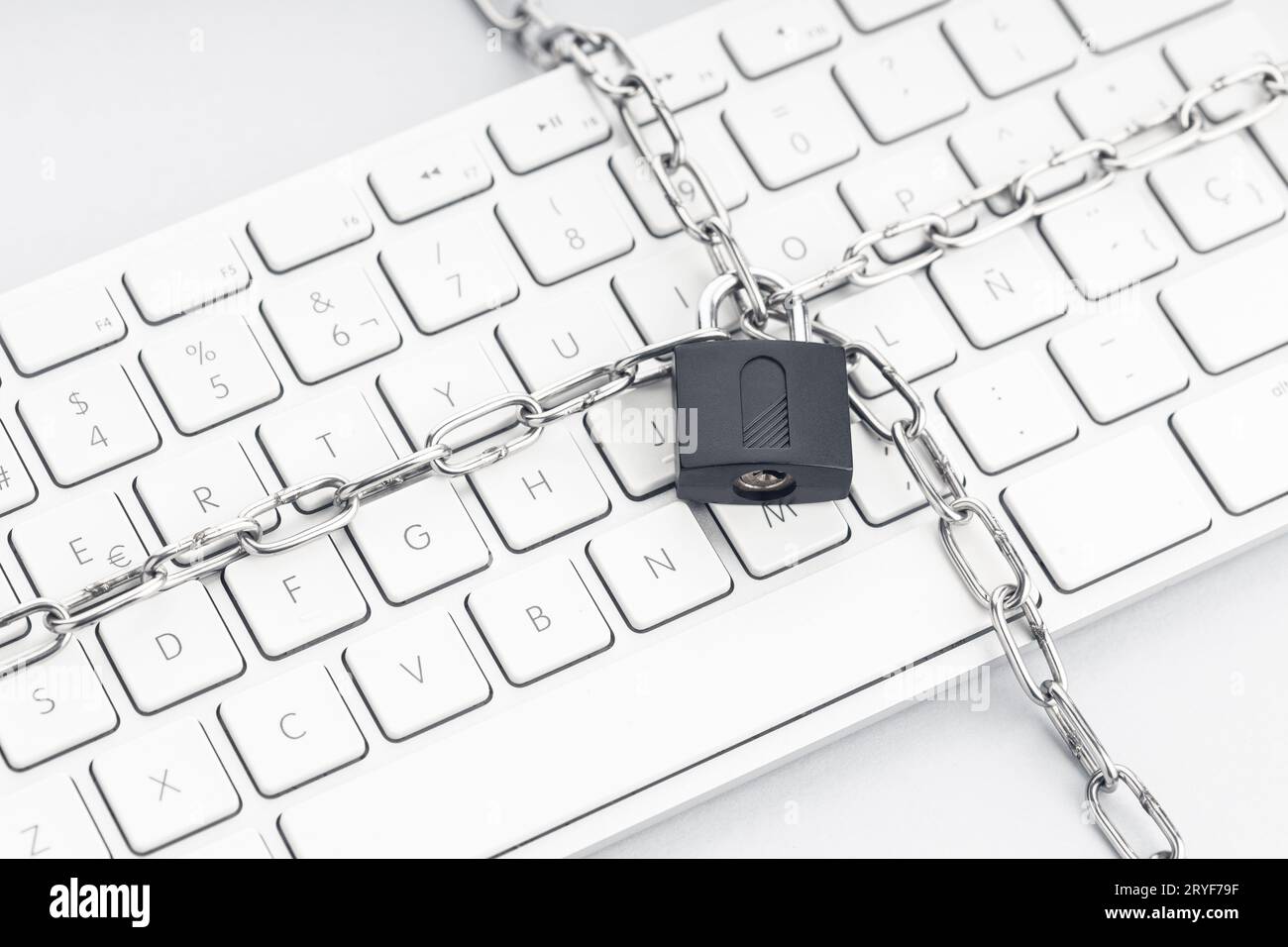 Computer Security concept. Chain and padlock on keyboard. Cyber security concept Stock Photo
