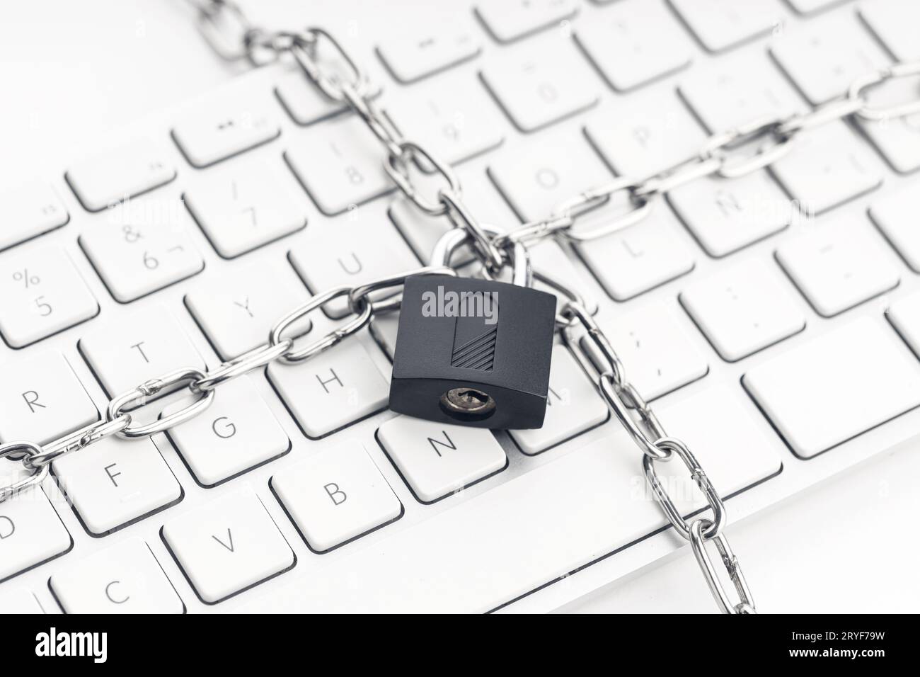 Computer Security concept. Chain and padlock on keyboard. Cyber security concept Stock Photo