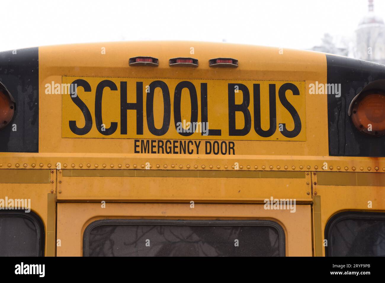 School bus for driving schoolchildren safely to school Stock Photo