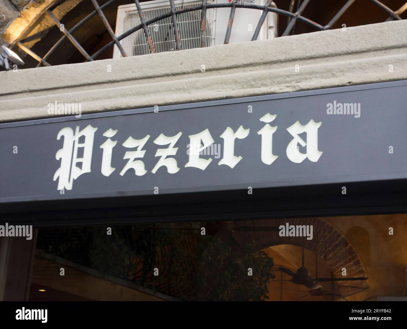 A pizzeria or pizzaria sign Stock Photo