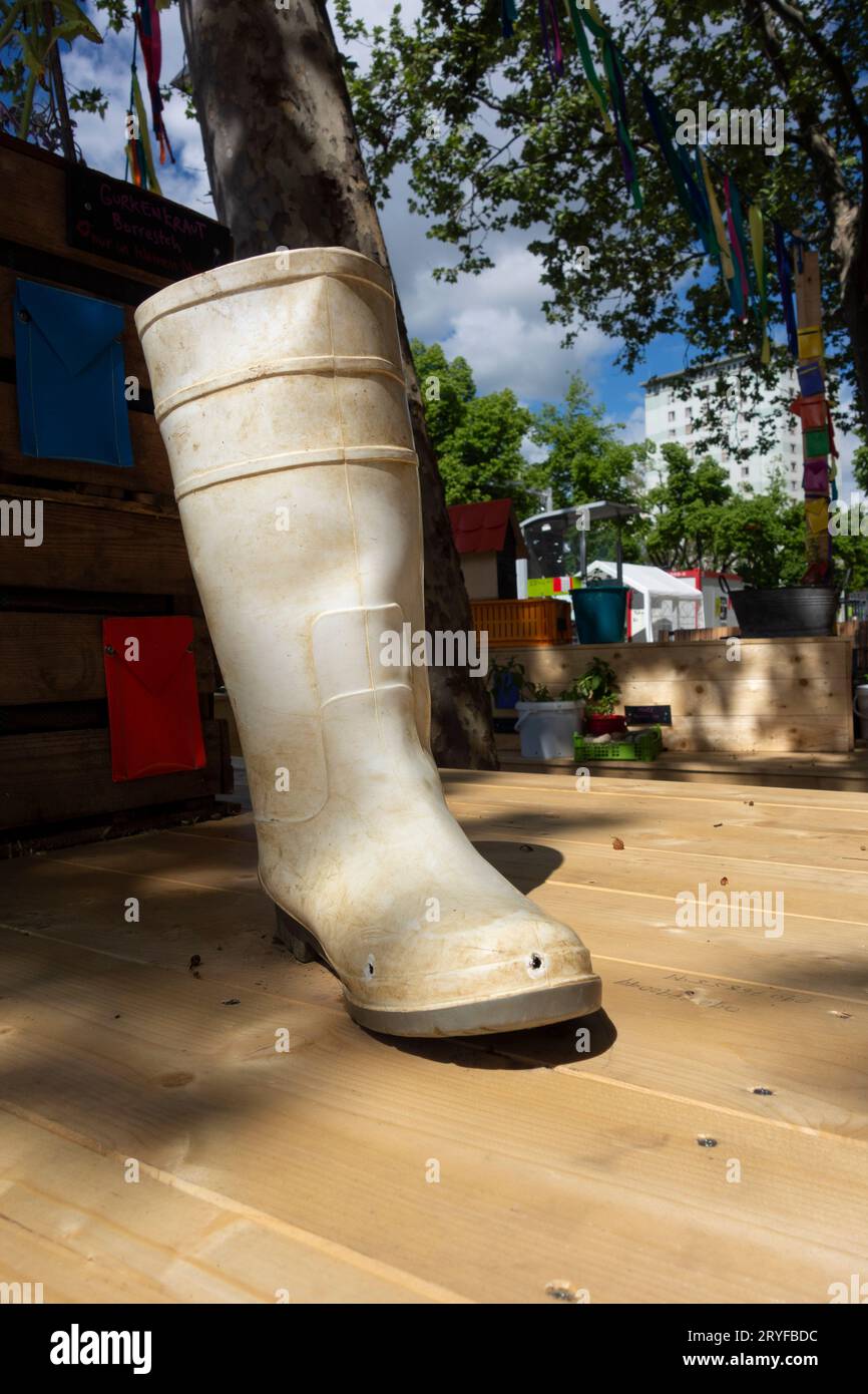 Walking in waterproof rubber boots Stock Photo