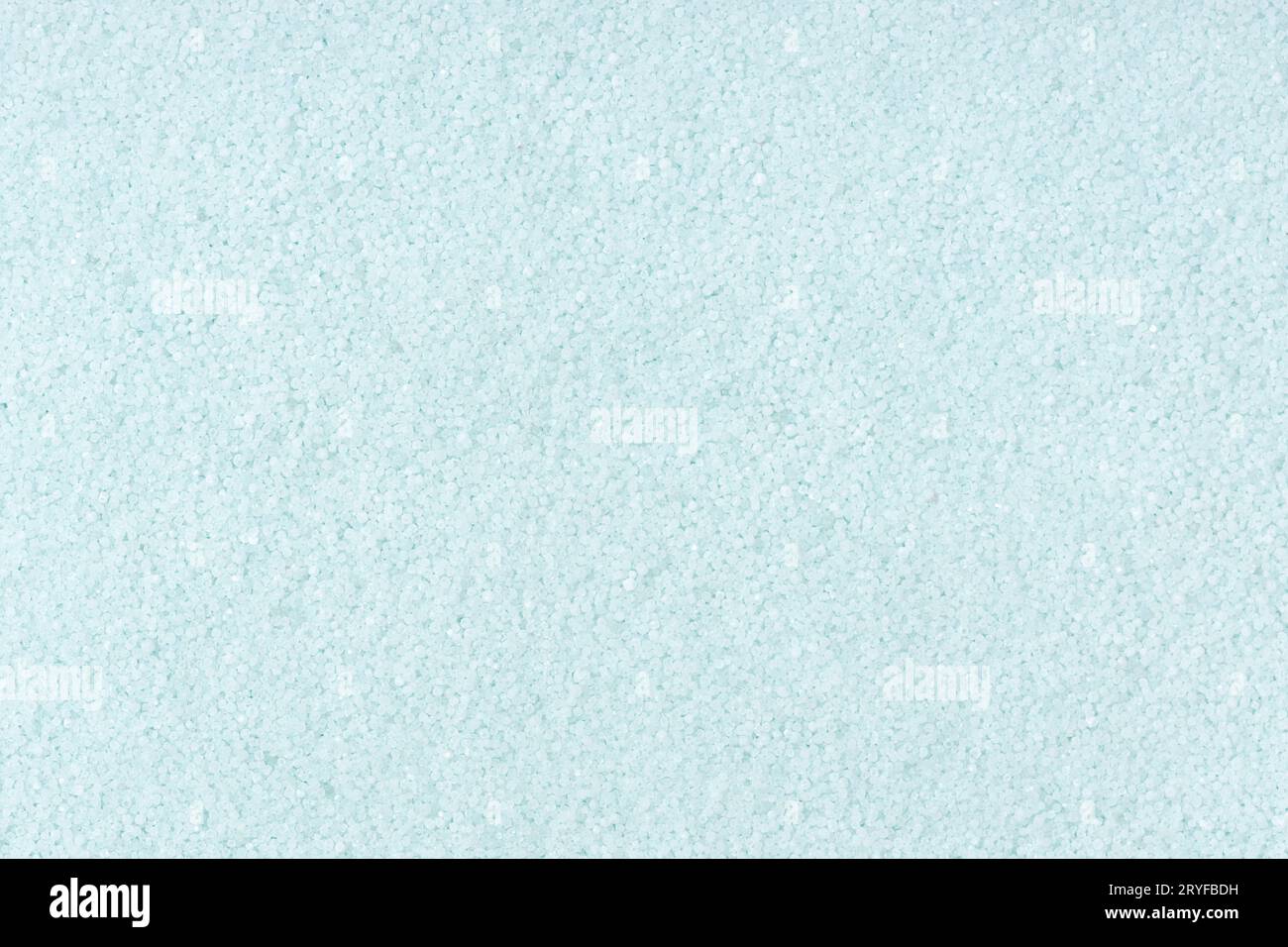Turquoise colored sand background texture. Full frame Stock Photo